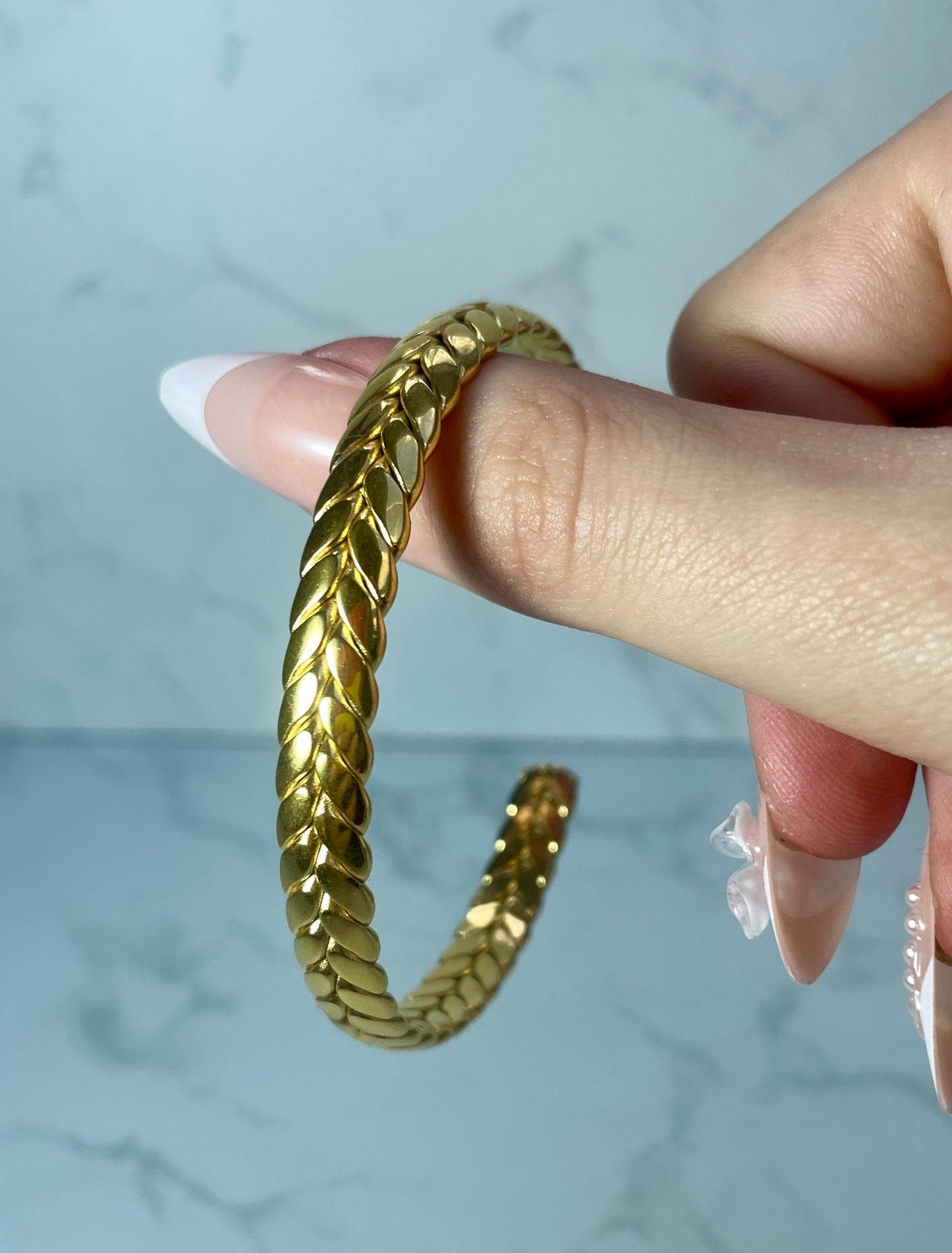 Gold cuff leave