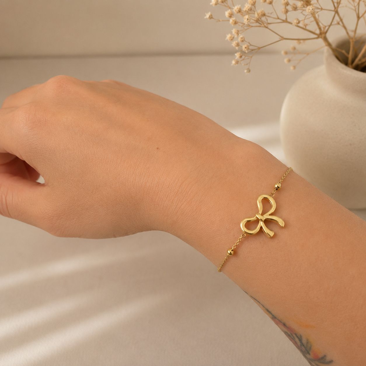 gold plated bow chain bracelet