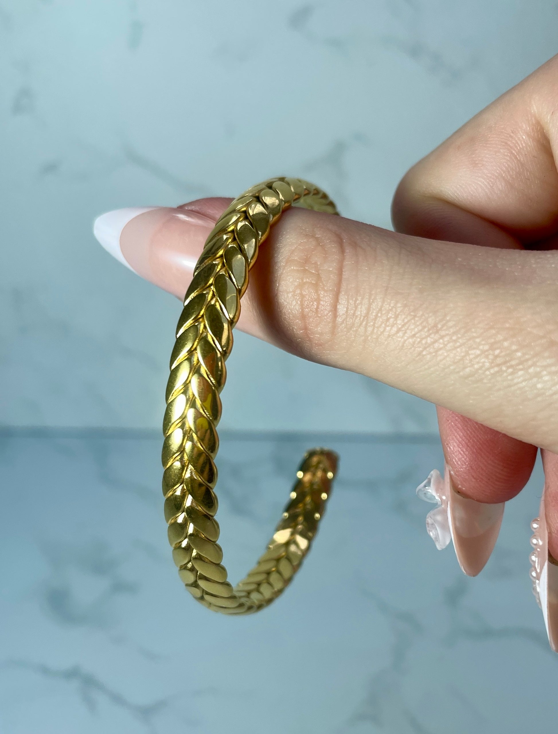 Gold cuff leave